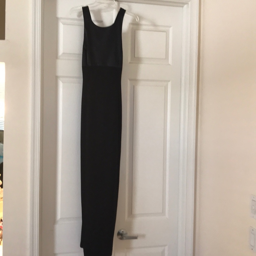 Black Papell fitted formal. Racer back size 10.